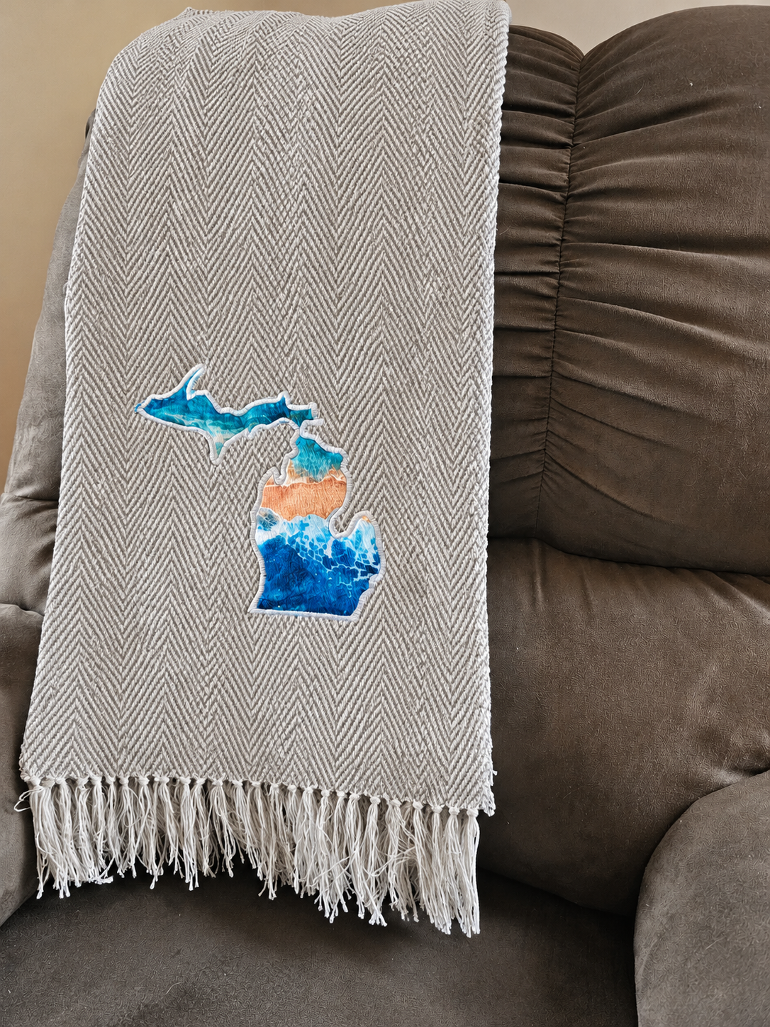 CloudSoft acrylic herringbone throw, stone lakeshore, with crisp geometric herringbone and fringe.